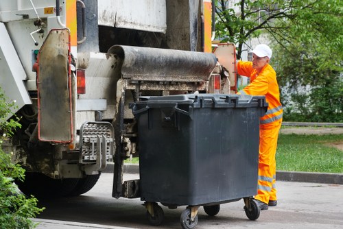 Satisfied customer using skip hire services in Gunnersbury